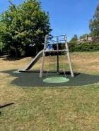 Climbing frame at the recreation ground on a sunny day under blue skys
