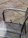 Fledgling Great tits on a garden chair